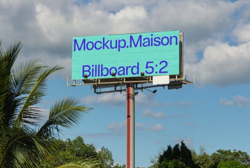 Billboard mockup on clear day with blue sky, ideal for digital advertising presentations, high-resolution designer resource.