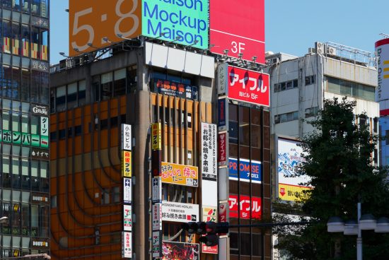 Urban building facade with multiple colorful billboards, signboards, and ads, ideal for mockup templates, graphic design, and urban settings.