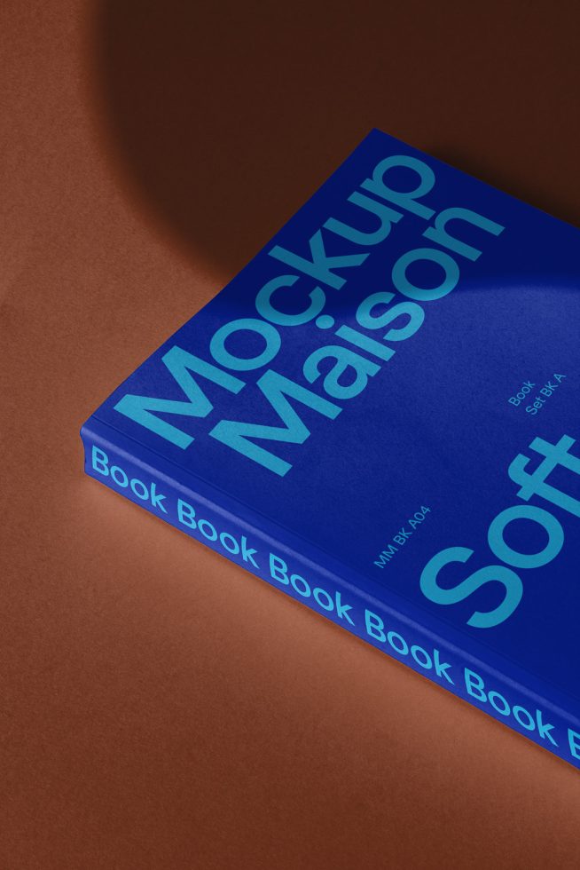 Blue book cover mockup with elegant design on a warm brown backdrop. Ideal for presenting graphics, fonts, and branding for designers.