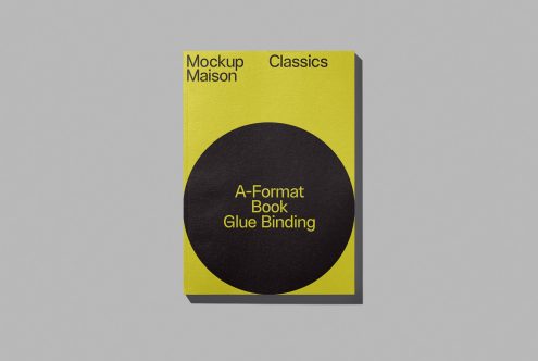 Yellow and black book cover mockup with glue binding on grey background, ideal for presenting graphic designs and font showcase.