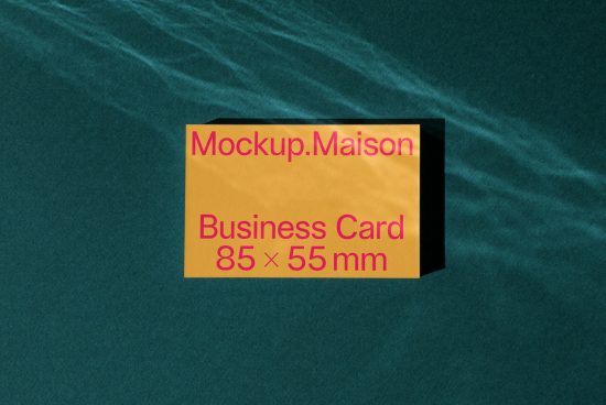 Business card mockup on a teal textured background with shadow, ideal for designers looking for realistic presentation tools.