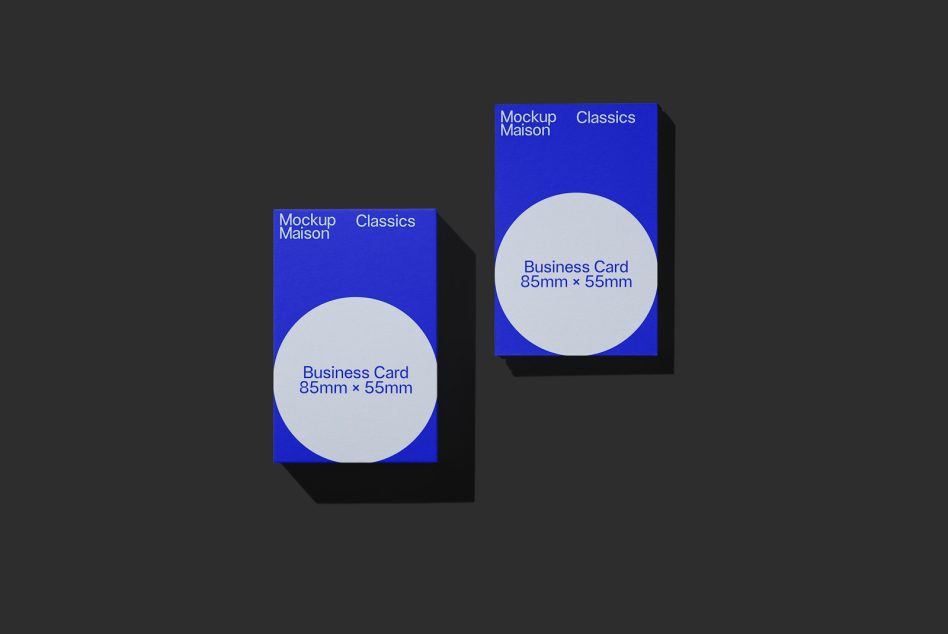 Two blue business card mockups 85mm by 55mm with white circle detail