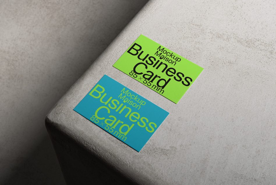 Realistic business card mockup on textured surface, showcasing design versatility for branding, suitable for graphic designers and print templates.