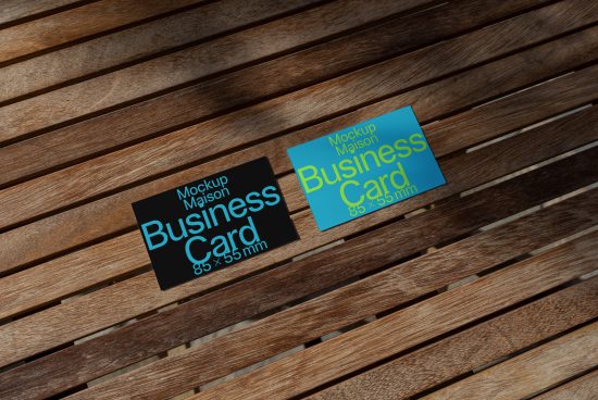 Business card mockups lying on wooden slats. Professional design asset for presenting corporate identity. Ideal for graphic designers' portfolios.