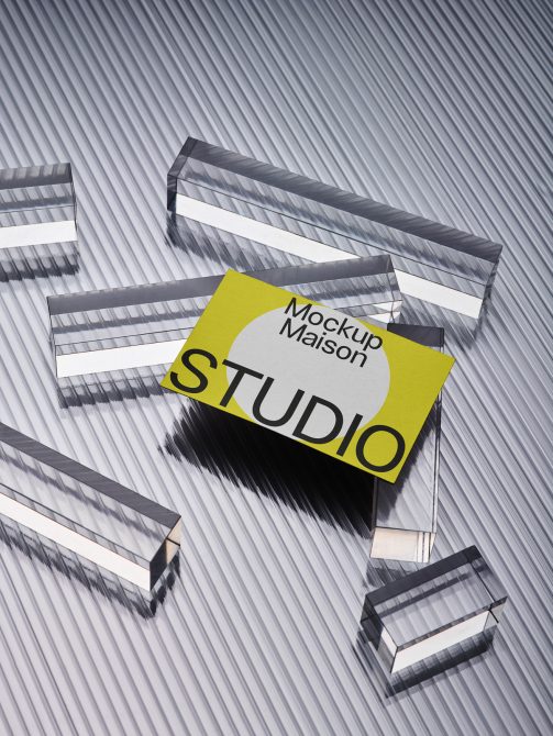 Business card mockup with reflective glass surfaces on striped pattern for graphic designers to present branding designs.