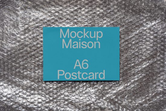 A6 postcard mockup on bubble wrap background, versatile graphic design asset for showcasing branding and stationery design layouts.