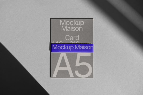 Professional A5 card mockup in sunlight for branding and graphic design presentations, featuring realistic shadows and elegant textures.
