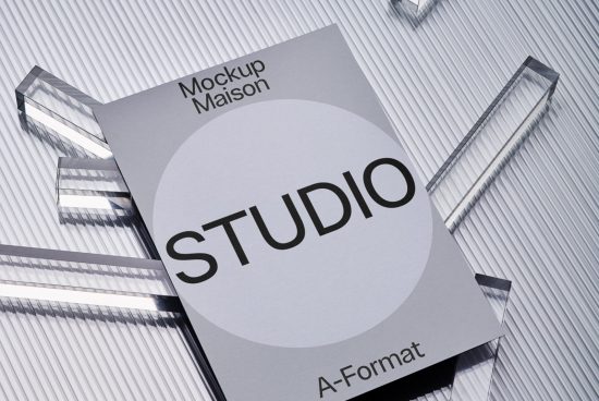 Elegant A-Format magazine mockup on striped surface with minimalist design, perfect for presentations, graphic designers portfolio.