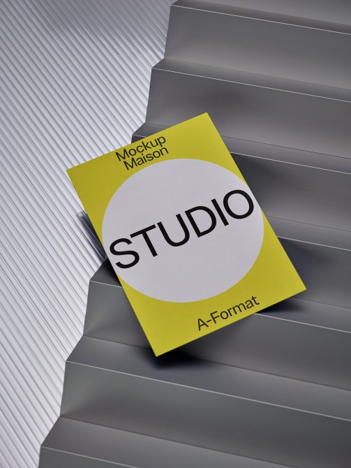 Bright yellow A-format poster mockup with white circle on corrugated metal background