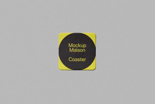 Yellow and black square coaster mockup centered on a grey background, ideal for branding and design presentations in mockups category.