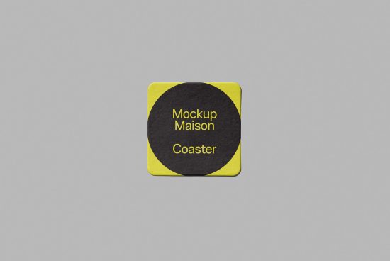 Yellow and black square coaster mockup centered on a grey background, ideal for branding and design presentations in mockups category.