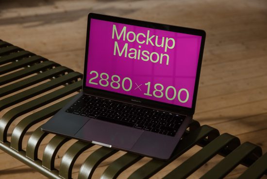 Laptop on bench with vibrant screen mockup displaying text Mockup Maison 2880x1800, ideal for designers looking for realistic mockup graphics.