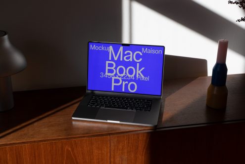 Laptop on desk with screen mockup in natural lighting for digital asset designers. Perfect for presentations and web templates.