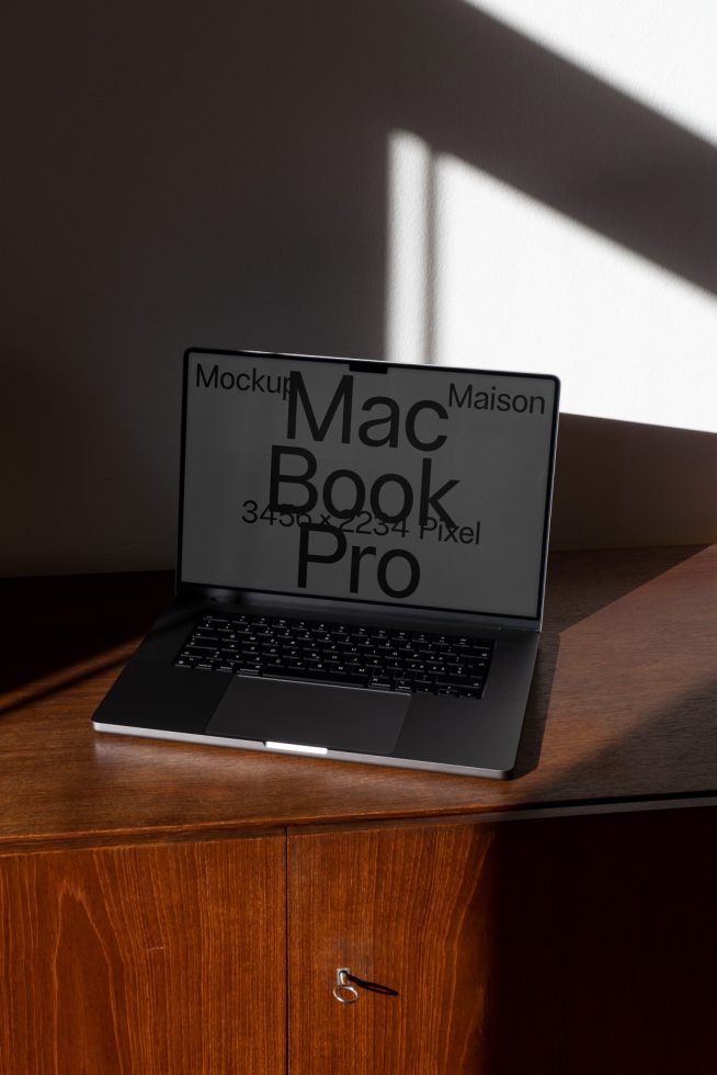 Laptop mockup on wooden desk with shadows, ideal for presenting digital designs, web templates, and UI/UX projects to enhance portfolio.