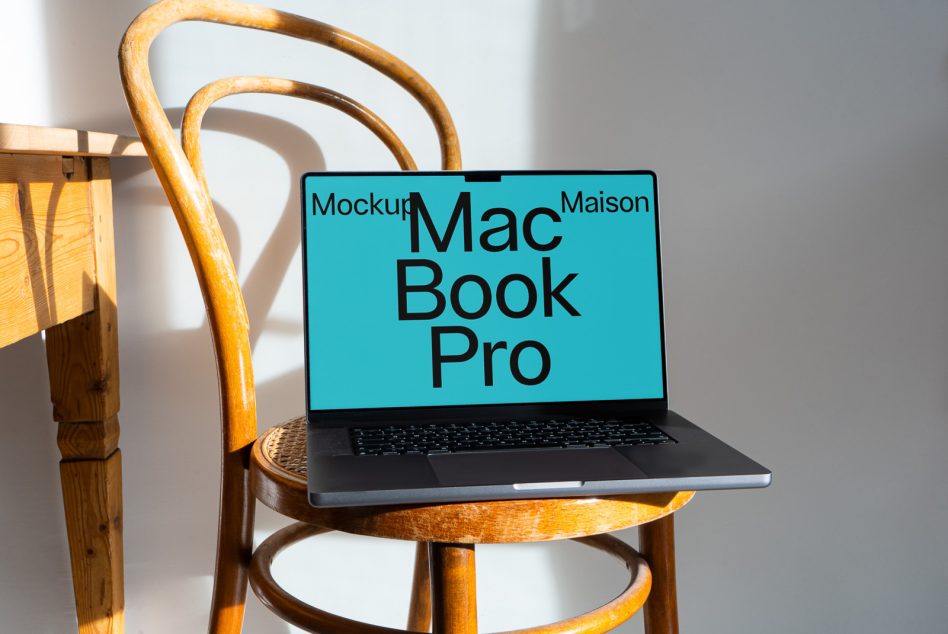 Laptop mockup on wooden chair in natural light, showcasing MacBook Pro screen for template design presentation, ideal for designers' digital assets.