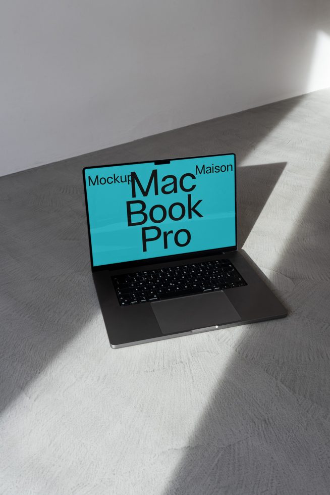 Laptop mockup on a white surface with shadows, realistic MacBook Pro display for digital design presentation, modern template.