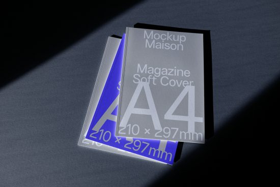 A4 magazine mockup with softcover in dramatic lighting, showcasing design space for presentation and portfolio on a designer's marketplace.