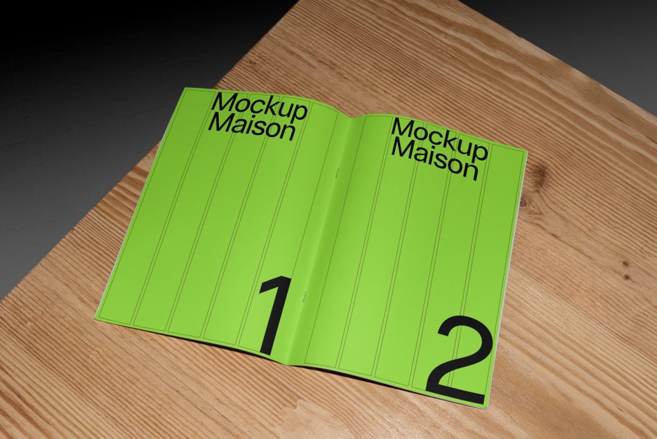 Bright green open brochure mockup with black numbers on wooden desk