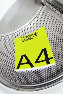 Neon yellow A4 paper mockup on textured metal drum machine surface