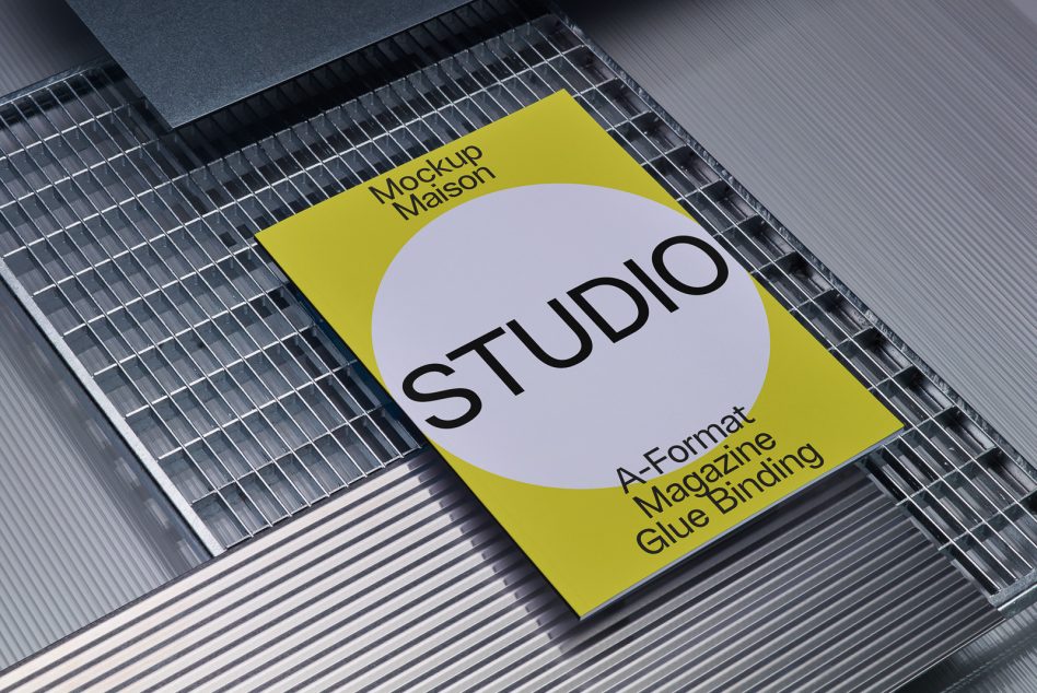Vibrant yellow A-Format magazine with glue binding showing soft circular cutout