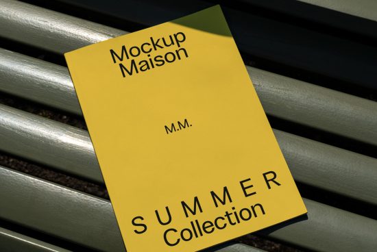 Yellow book cover mockup with title Mockup Maison and Summer Collection text on park bench for graphic design presentations.