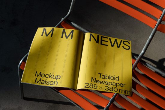 Tabloid newspaper mockup on metal chair, realistic shadows, design presentation, 289x380mm, print template, graphic asset for designers.