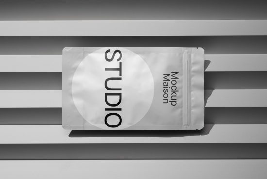 Versatile zip pouch mockup on striped background, realistic shadows, perfect for branding presentations and packaging designs.