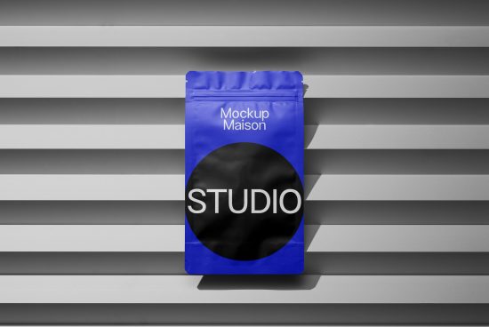 Blue packaging mockup with minimalist black and white design on striped background for product presentation. Ideal for designers digital assets.