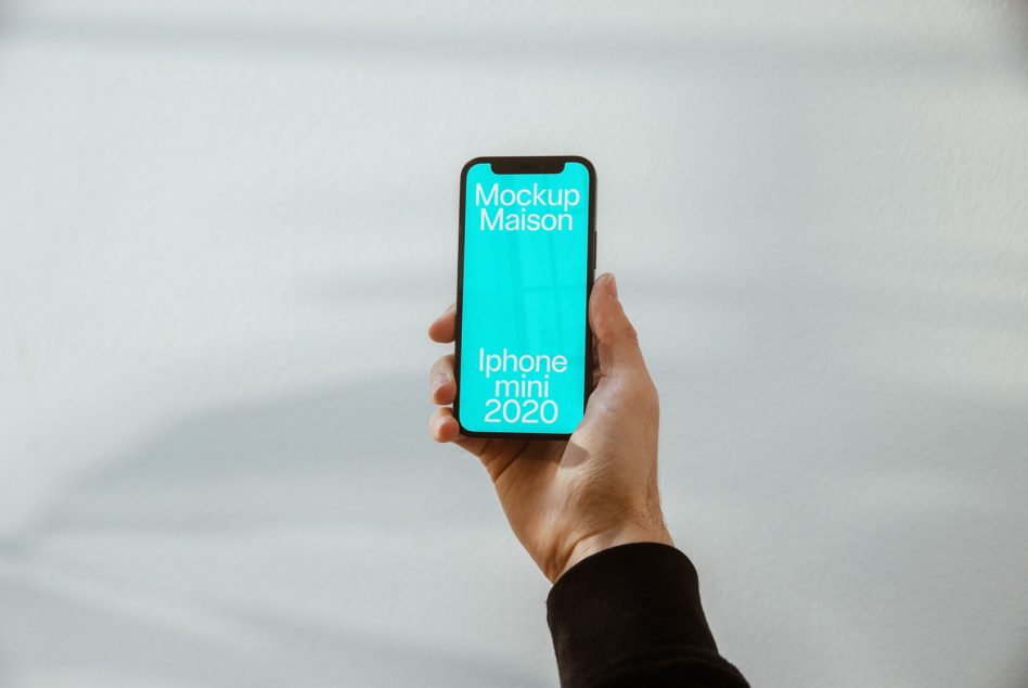 Hand-held iPhone mini mockup with editable screen on white background, ideal for digital design presentations and app interface demos.