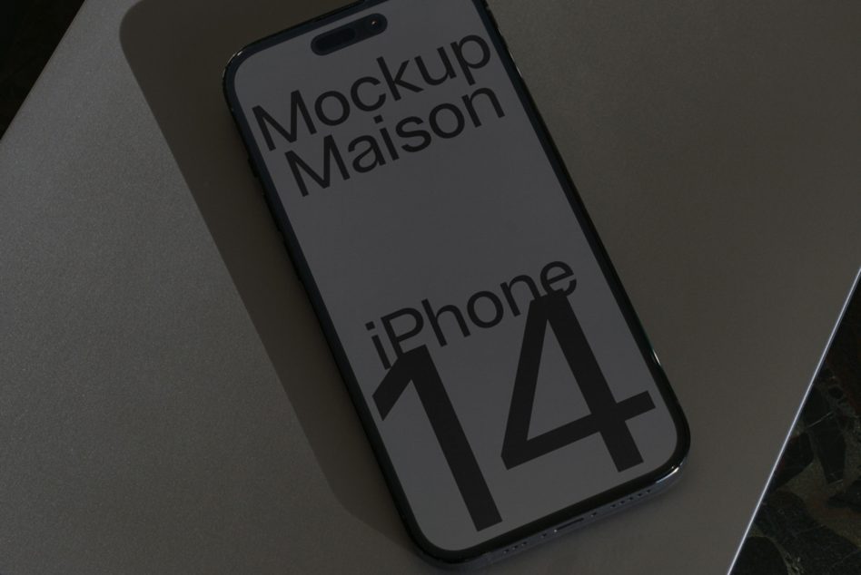 Realistic iPhone 14 mockup on a matte surface showcasing screen design, ideal for app interface presentations, digital assets for design professionals.