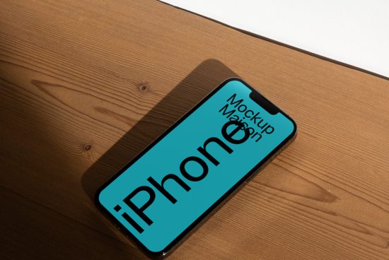 Realistic smartphone mockup on wooden surface for app design presentation. High-quality iPhone template for graphic display.