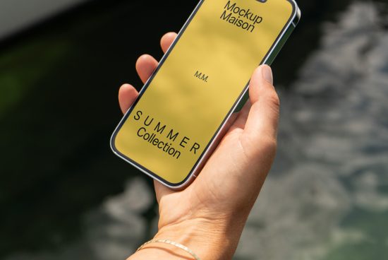 Hand holding smartphone with yellow screen mockup for Summer Collection advertisement, clean design, device mockup for designers.