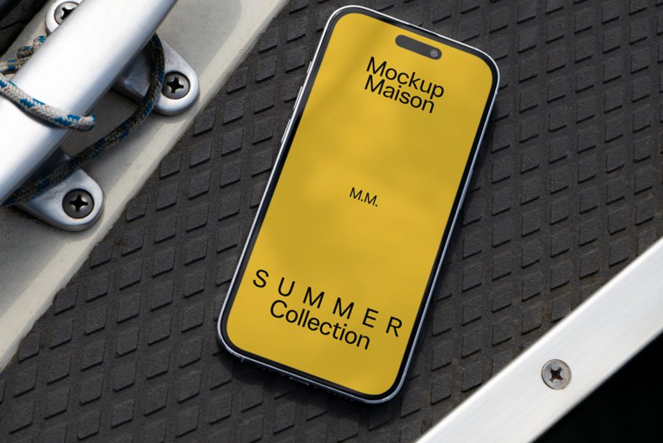 Yellow iPhone on dark industrial surface with white rope-handled bottle visible