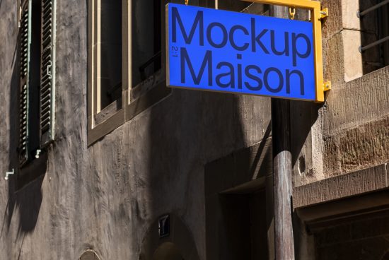 Blue signboard reading Mockup Maison on an urban building, perfect for designers looking for mockup graphics inspiration.