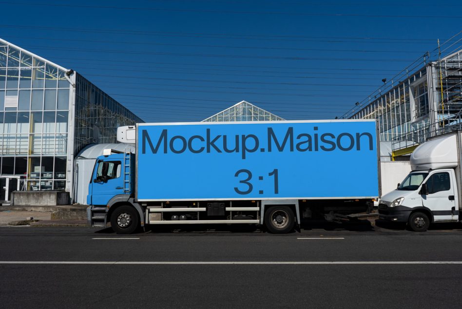 Side view of a delivery truck mockup with clear blue branding space for designers to visualize their logos and advertisements in a realistic setting.