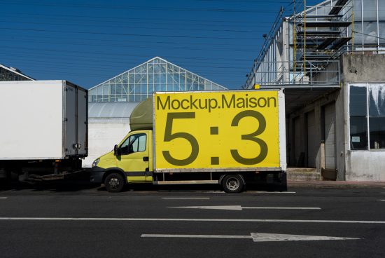 Yellow delivery truck mockup with industrial background for display advertising, vehicle branding design mockup, urban transport template.