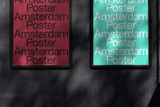 Two illuminated poster frames on a dark brick wall, one red, one cyan, with repeated text, ideal for mockup designs and templates.