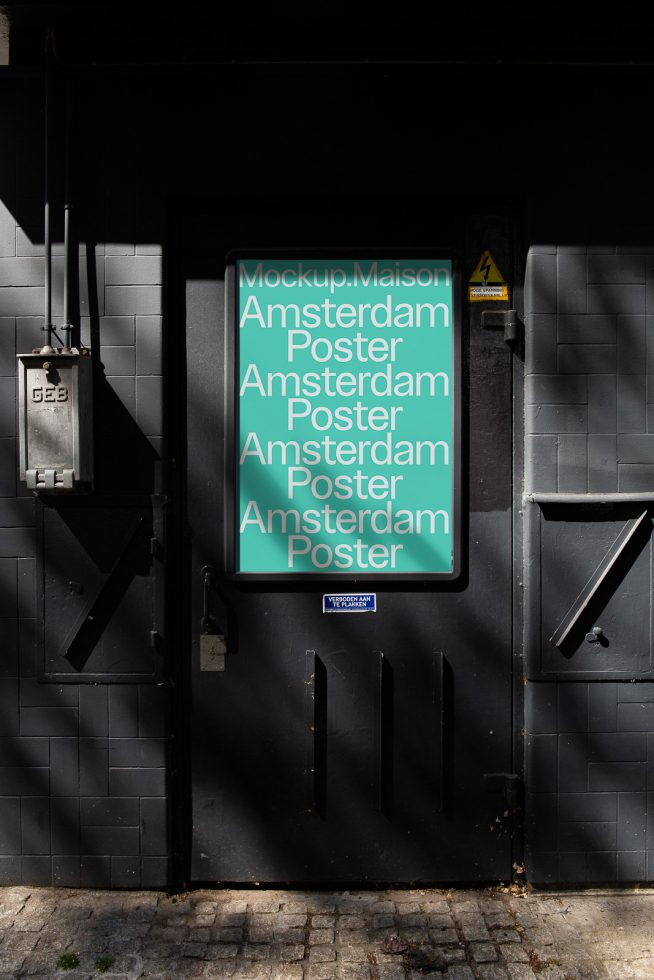 Urban street poster mockup on a dark wall with lighting for graphic designers and branding presentations.