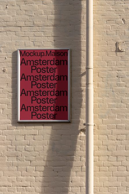 Wall-mounted poster mockup on a brick surface with typography design, ideal for presenting designs or fonts in a realistic setting.