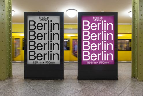 Two striking mockup posters in a subway station, both featuring bold 'Berlin' text, one on a black background and the other purple. Ideal for graphic design.