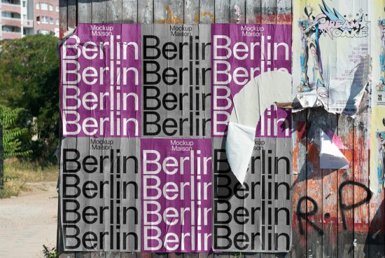 Urban poster mockups on a wooden wall with graffiti, with the word "Berlin" repeated in a bold font. Ideal for graphic design presentations.