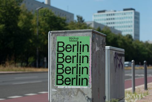 Street poster mockup featuring bold 'Berlin' text on urban background for graphic designers. Ideal for presenting branding and advertising designs.