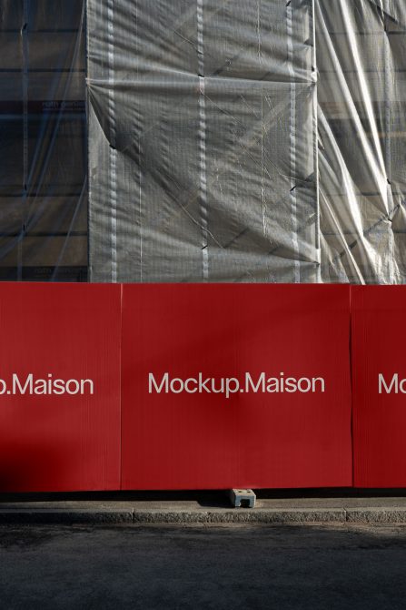 Red construction barricade with Mockup.Maison branding, urban setting for designers to showcase logo or ad design mockups.