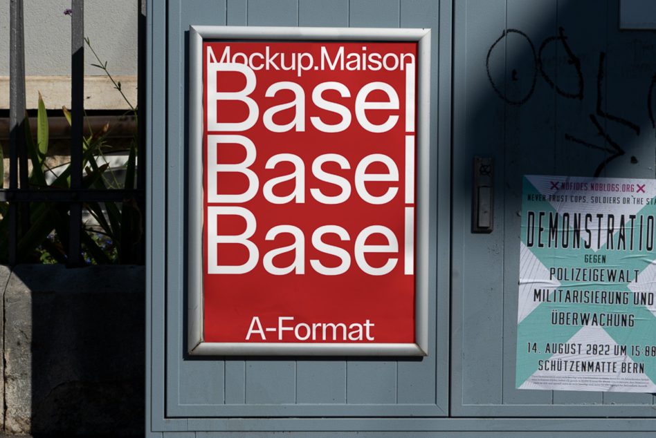 Red A-Format poster mockup in white frame mounted on gray door