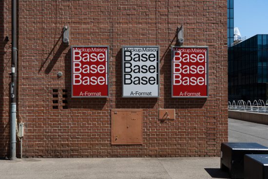 Three urban poster mockups on brick wall for outdoor advertising and design presentation, with clear sky and modern buildings, targeting designers.