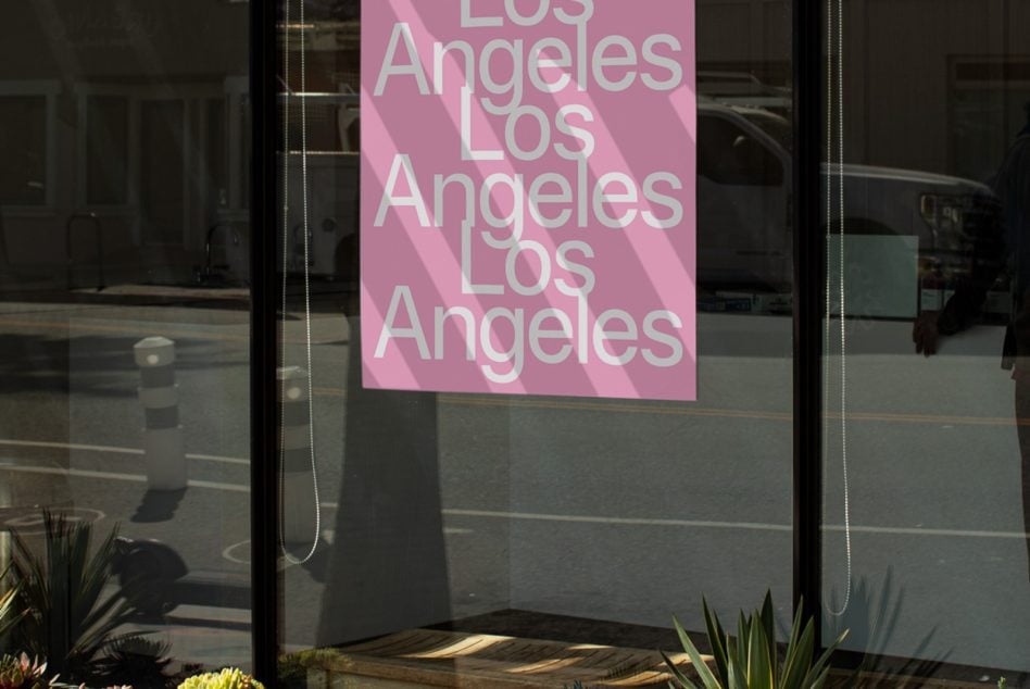 Pink storefront sign with Los Angeles text repeated in white letters