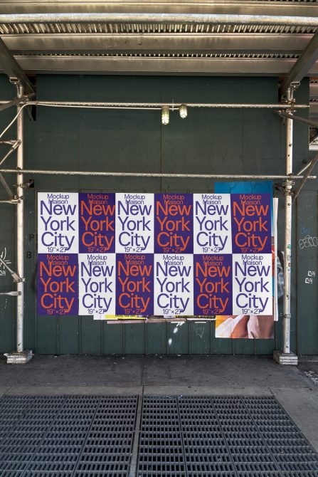 Urban poster mockup on city wall for designers, showing colorful New York City typography, perfect for graphic design presentations.