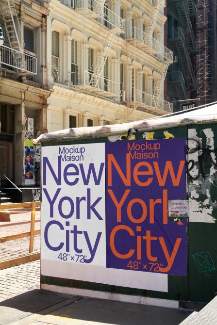 Urban billboard mockup with New York City text on the street, displaying clear space for graphic design and advertising content.