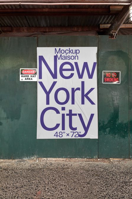 Poster mockup on a construction barricade with urban typography design displaying New York City, suitable for graphics and templates.