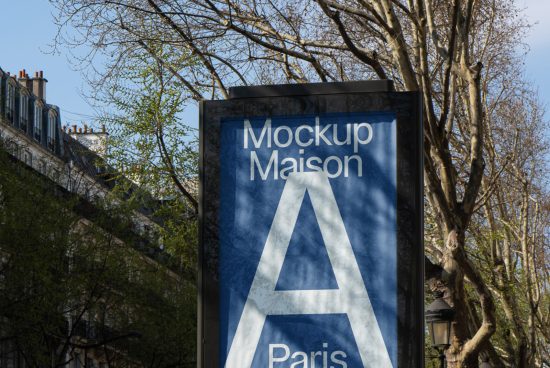 Outdoor billboard mockup with elegant blue design text 'Mockup Maison' displayed in an urban Paris setting among trees and Parisian architecture.